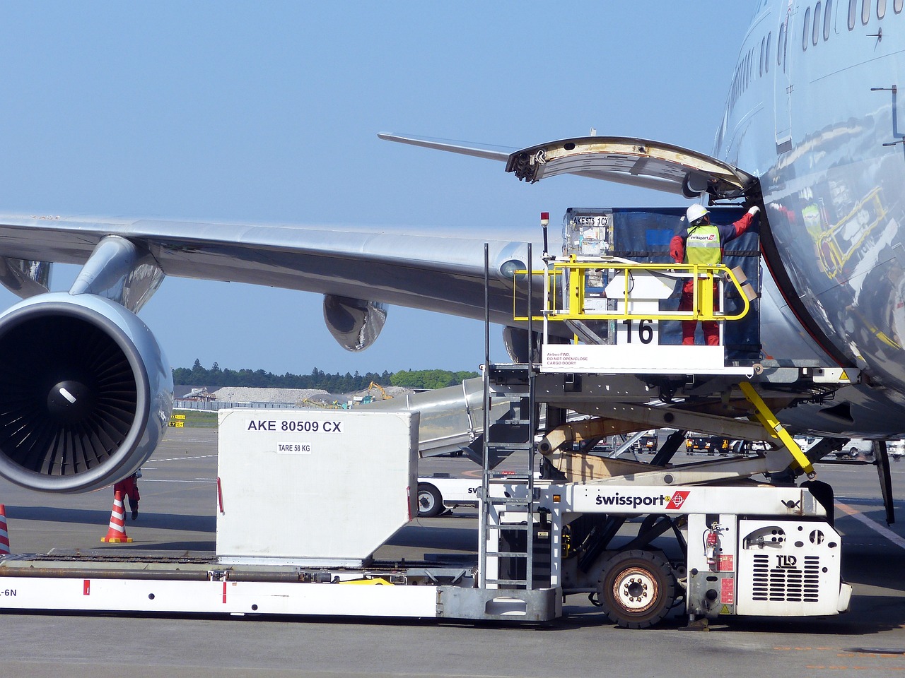 Cargo aircraft being loaded through the nose door