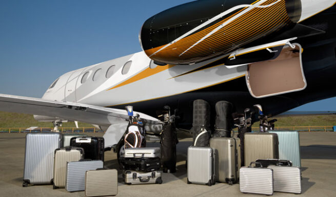 Family boarding a private jet for a relocation flight